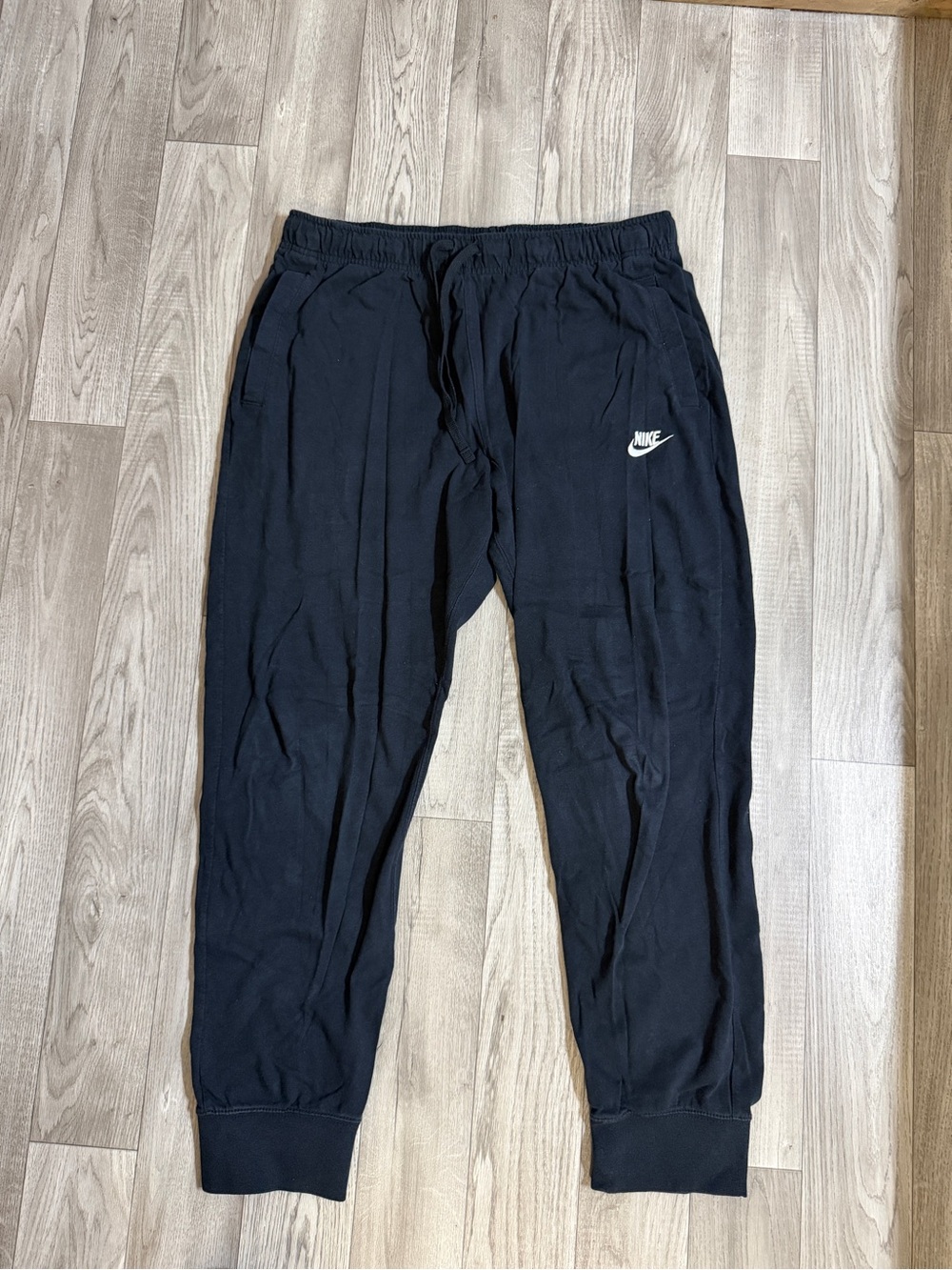 Nike Black Men's Pullover Jogger Pants with White Swoosh